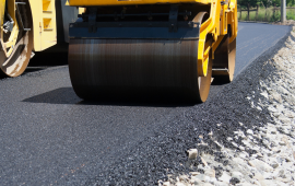 steamroller paving a street