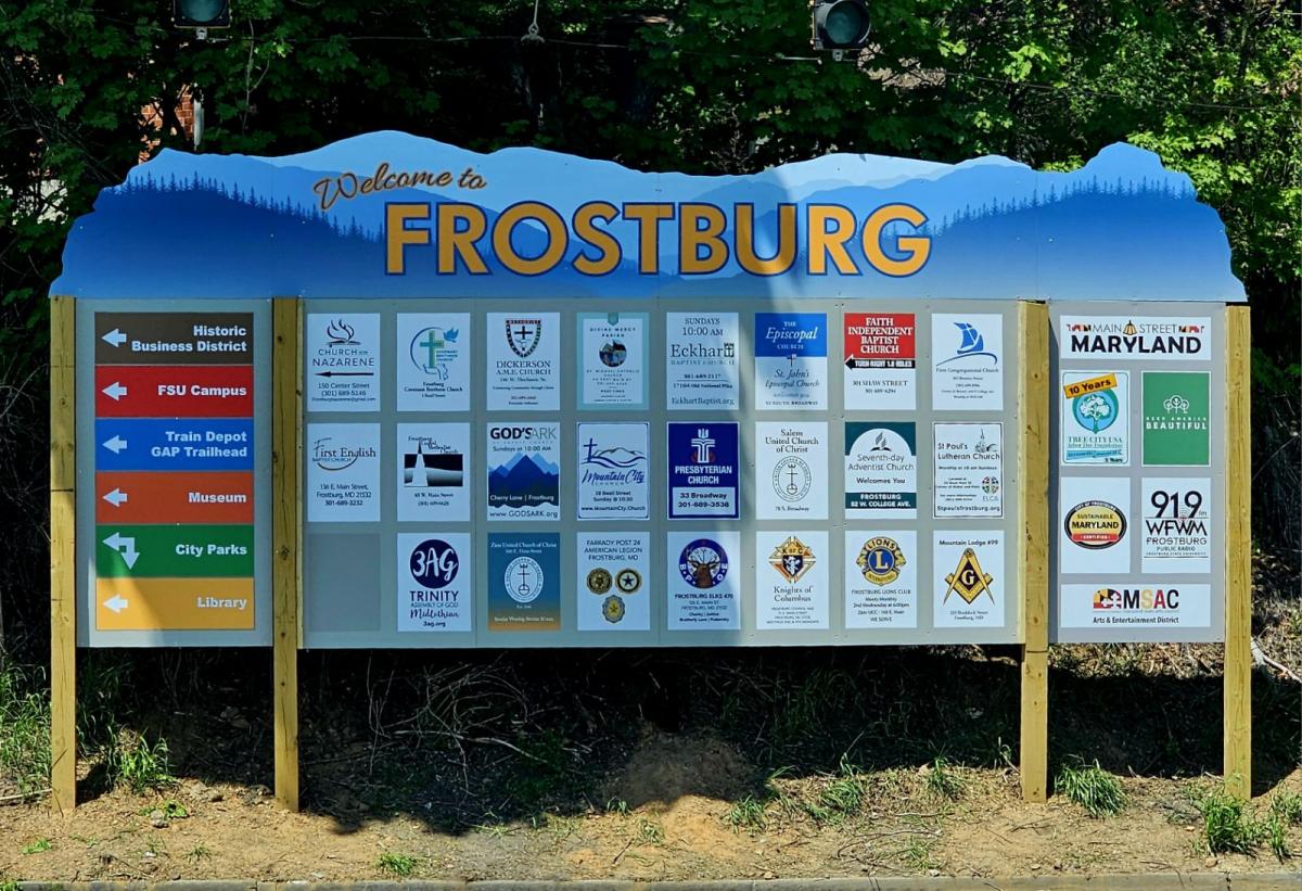 The Frostburg Welcome Sign containing the logos of local churches and fraternal organizations
